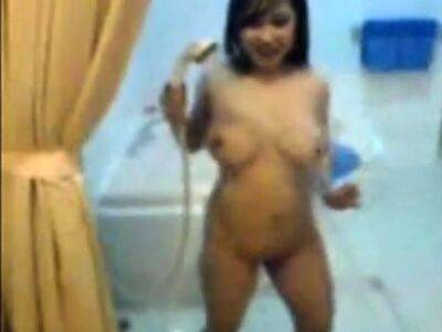 busty indonesian babe playing her boobs and in shower - drtuber.com - Indonesia