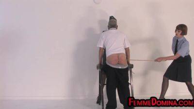 Uniformed whipping femdoms lashing sub ass in 3some - hotmovs.com